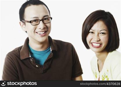 Portrait of a young couple smiling