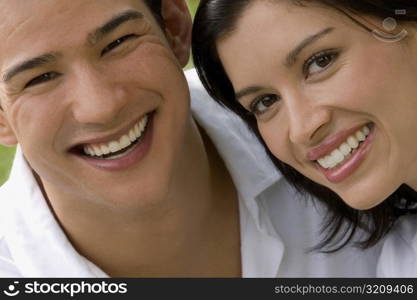 Portrait of a young couple smiling together