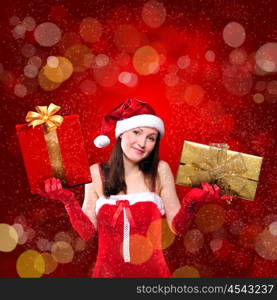 Portrait of a young girl dressed as Santa Claus on a red background. Girl gives gifts. Happy New Year and Merry Christmas!