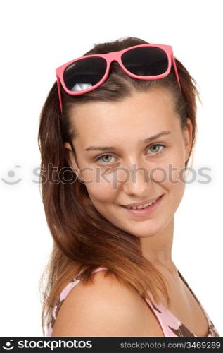 portrait of a young girl in pink glasses isolated on a white background