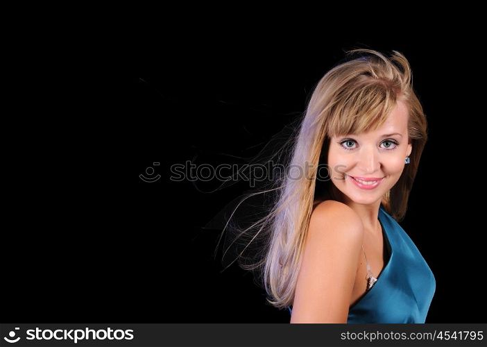 Portrait of a young girl on a black background
