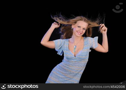 Portrait of a young girl on a black background