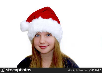 Portrait of a young girl wearing Santa&acute;s hat isolated on white background
