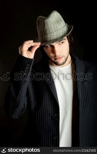 Portrait of a young guy with a cool hat