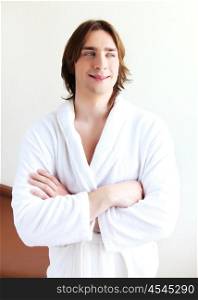 portrait of a young handsome man in bath robe