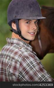 Portrait of a young horseback rider
