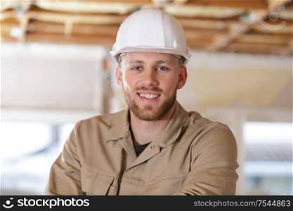 portrait of a young male builder