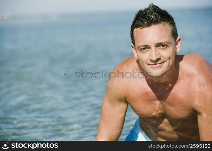 Portrait of a young man grinning