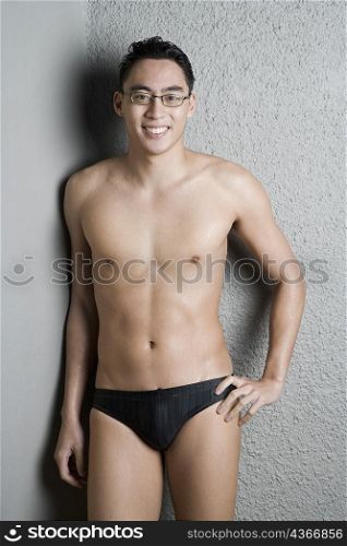Portrait of a young man in swimwear
