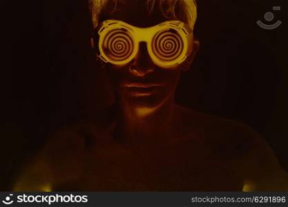 portrait of a young man in the fluorescent glow
