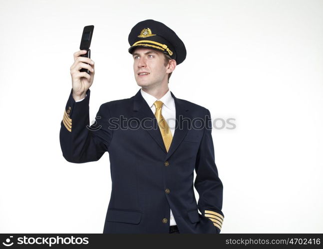 Portrait of a young man in the form of a passenger plane pilot