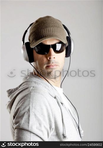 Portrait of a  young man listen music with headphones
