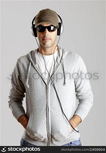 Portrait of a  young man listen music with headphones