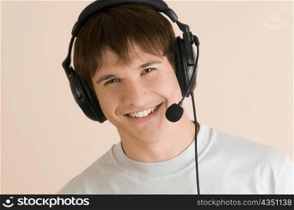 Portrait of a young man listening to music