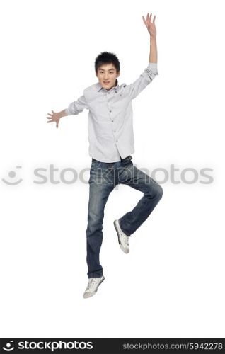 Portrait of a young man mid-air