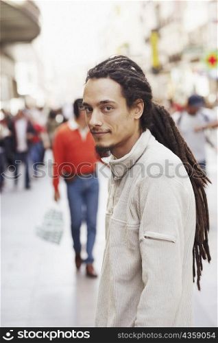 Portrait of a young man on the street
