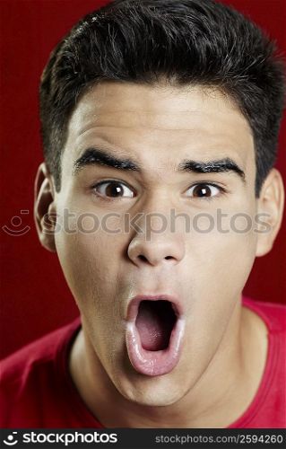 Portrait of a young man shouting