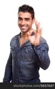 Portrait of a young man showing Ok sign