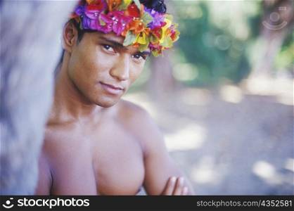 Portrait of a young man smiling, Hawaii, USA