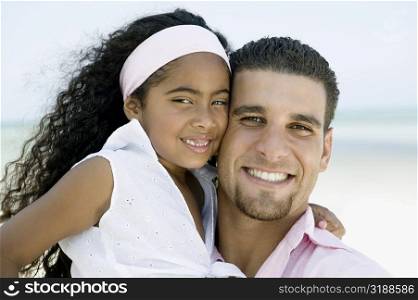 Portrait of a young man smiling with a girl