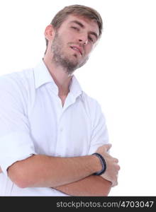 Portrait of a young man standing against white background