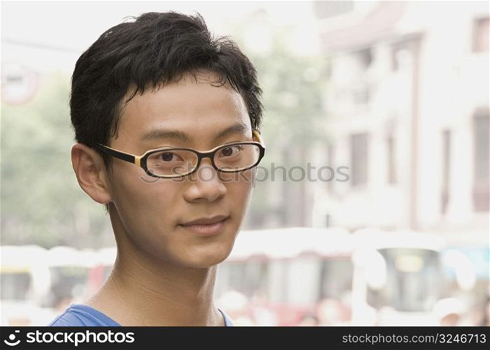 Portrait of a young man wearing eyeglasses