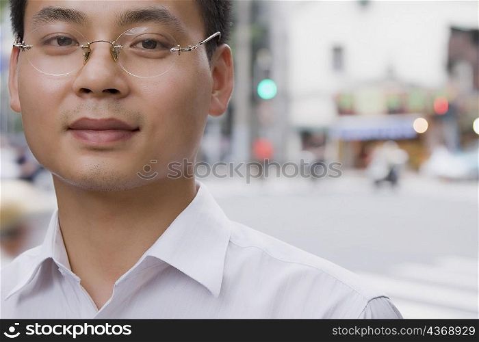 Portrait of a young man wearing eyeglasses