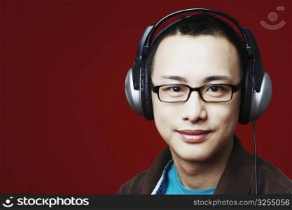 Portrait of a young man wearing headphones