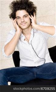 Portrait of a young man wearing headphones
