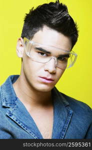 Portrait of a young man wearing protective eyewear