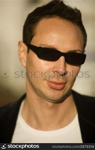 Portrait of a young man wearing sunglasses