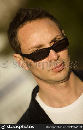 Portrait of a young man wearing sunglasses