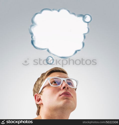 Portrait of a young man with a blank speech bubble over his head