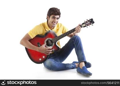 Portrait of a young man with a guitar