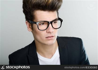 Portrait of a young man with eyeglasses