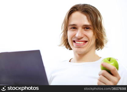 Portrait of a young man with notebook