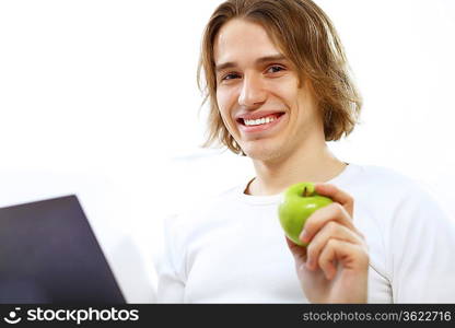 Portrait of a young man with notebook