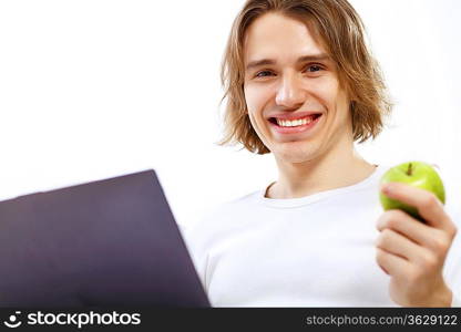 Portrait of a young man with notebook