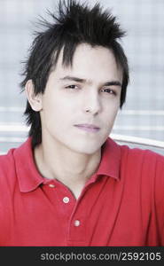 Portrait of a young man with spiky hair