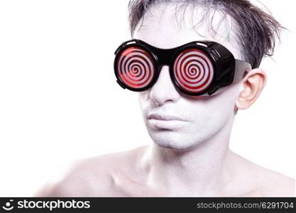 Portrait of a young man with white skin in strange glasses isolated on white background