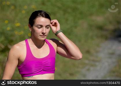 portrait of a young sporty woman in the countryside