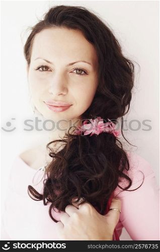Portrait of a young woman grinning
