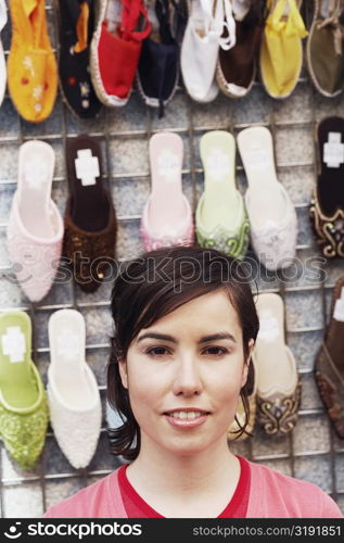 Portrait of a young woman in a shoe store