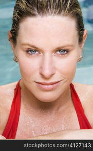 Portrait of a young woman in a swimming pool