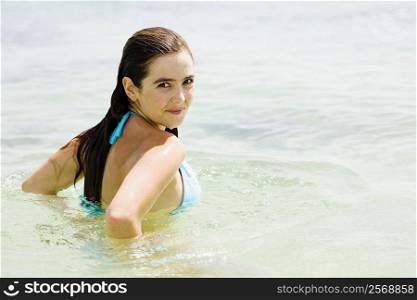 Portrait of a young woman in the sea
