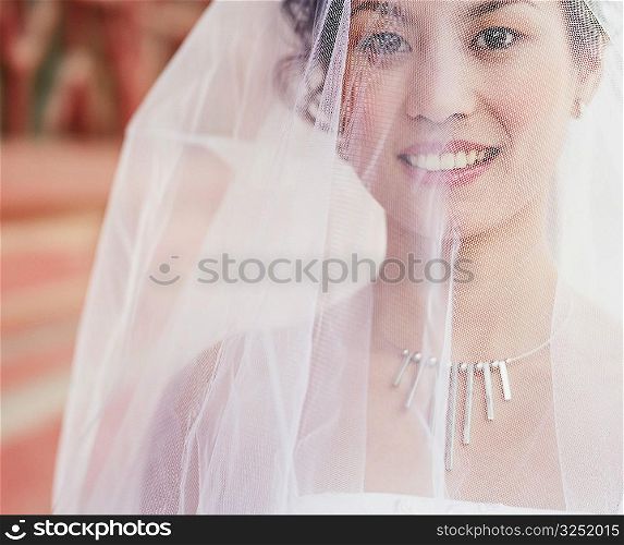 Portrait of a young woman in the wedding dress
