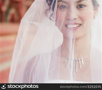 Portrait of a young woman in the wedding dress