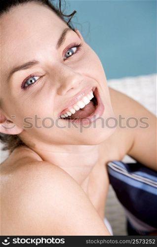 Portrait of a young woman laughing
