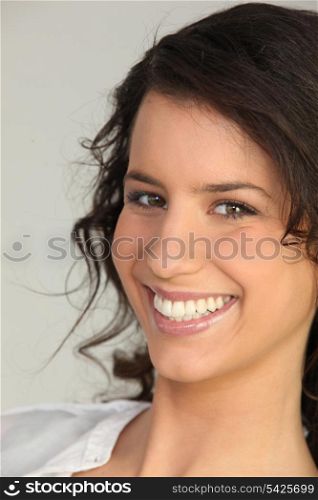 Portrait of a young woman laughing