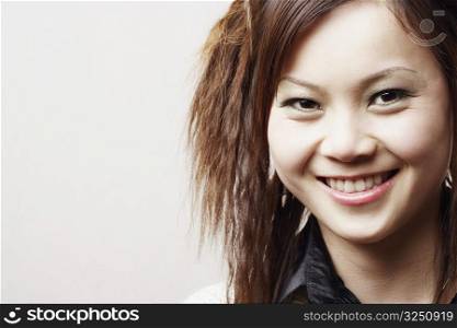 Portrait of a young woman looking cheerful